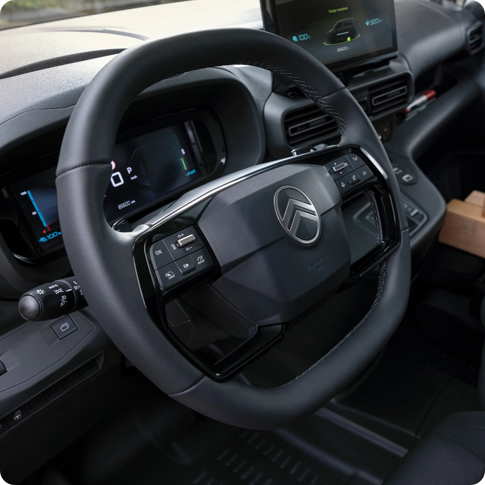 Interior cockpit view of a Citroën Berlingo Van showing optimised cabin space, smart storage and connected features.