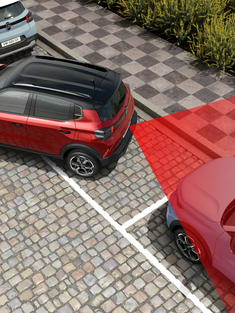 Draufsicht auf den Citroën ë-C3 Elektro-SUV, die hintere Parksensoren für sichereres, selbstbewusstes und erschwingliches Stadtmanövrieren zeigt.