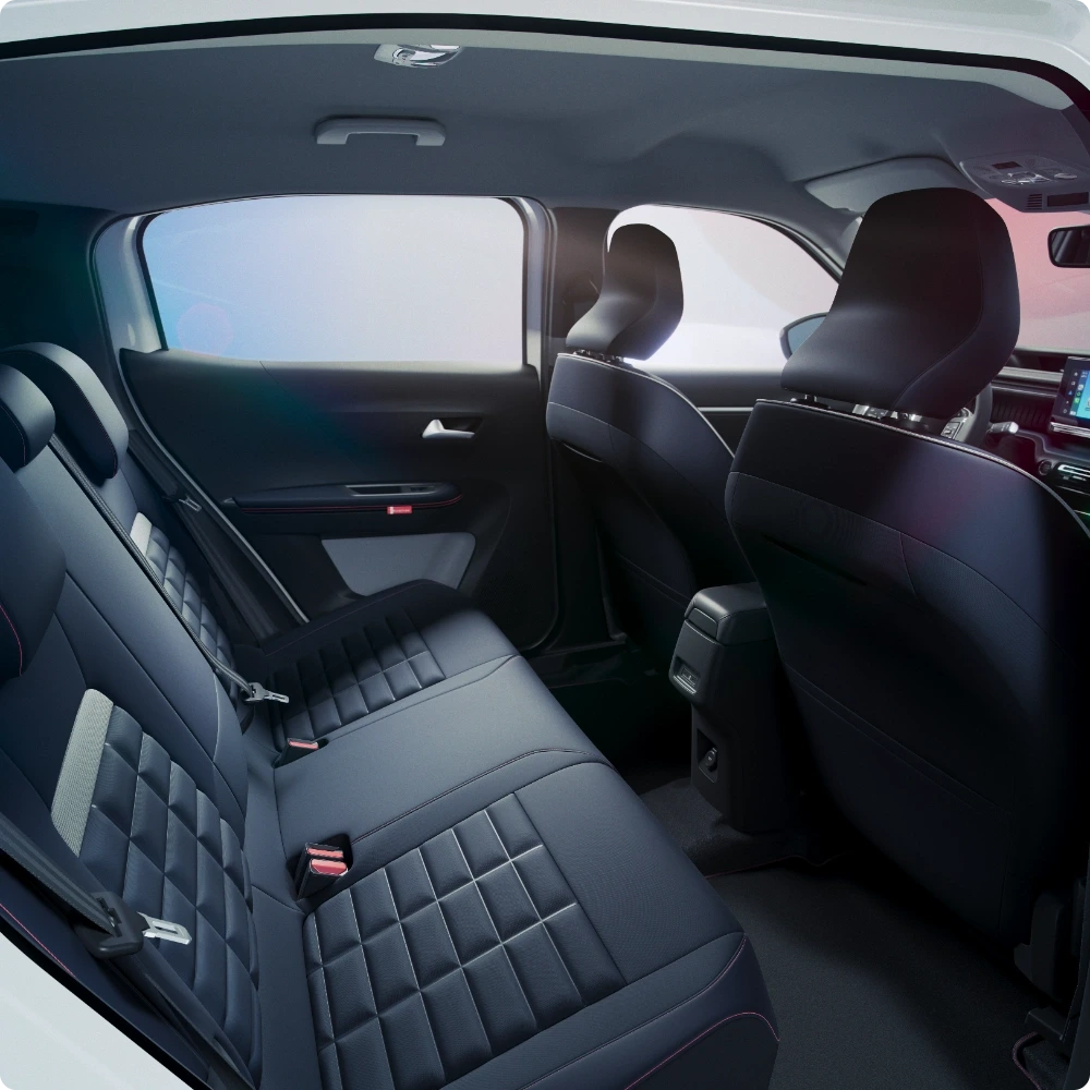 Rear interior view of Citroën C3 Aircross SUV showcasing spacious lounge‑style seating for relaxed, comfortable and affordable long‑journey mobility.