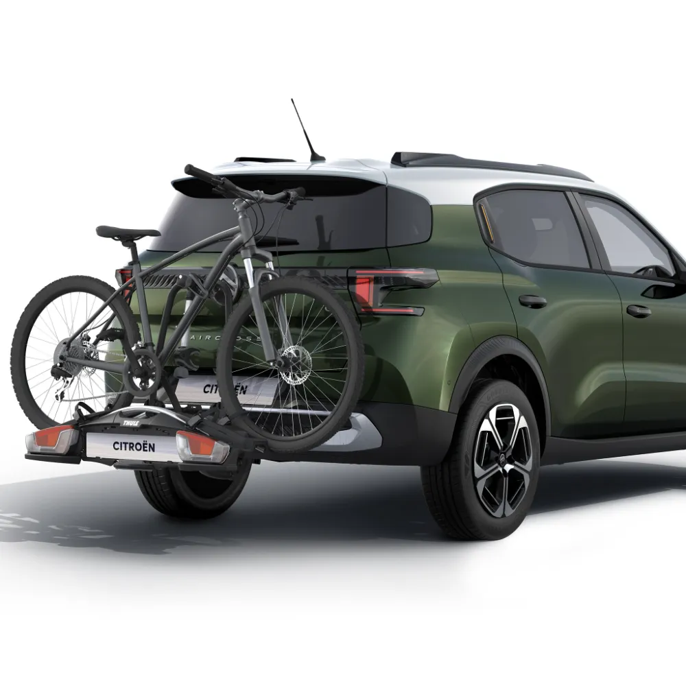 Rear view of Citroën C3 Aircross SUV with bicycle carrier showing easy bike transport for versatile, affordable mobility.