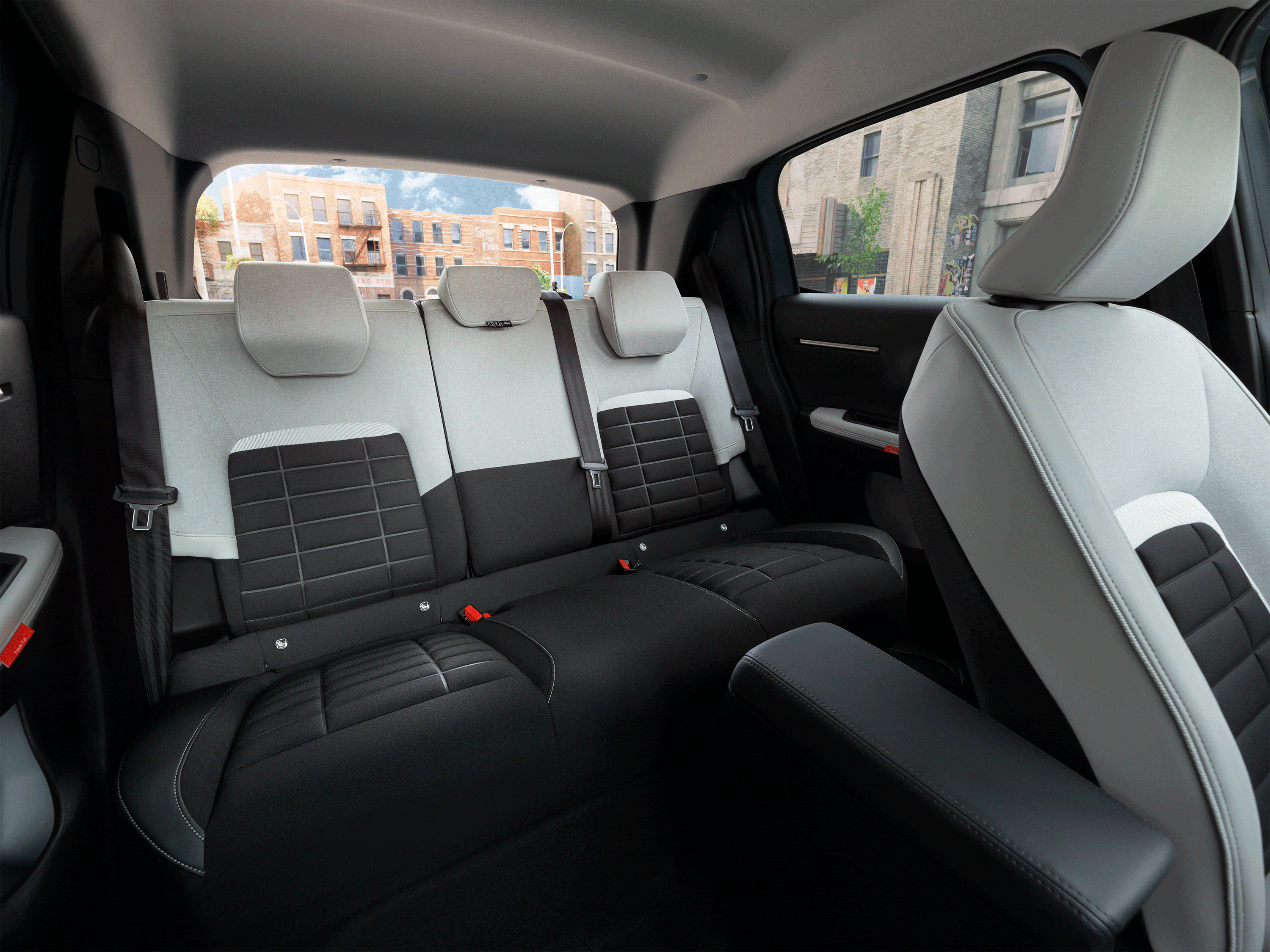 Innenraumansicht des Citroën C3 Kompaktwagens, die Sitzkomfort-Einstellungen für sanftere, erschwingliche Alltagsmobilität hervorhebt.