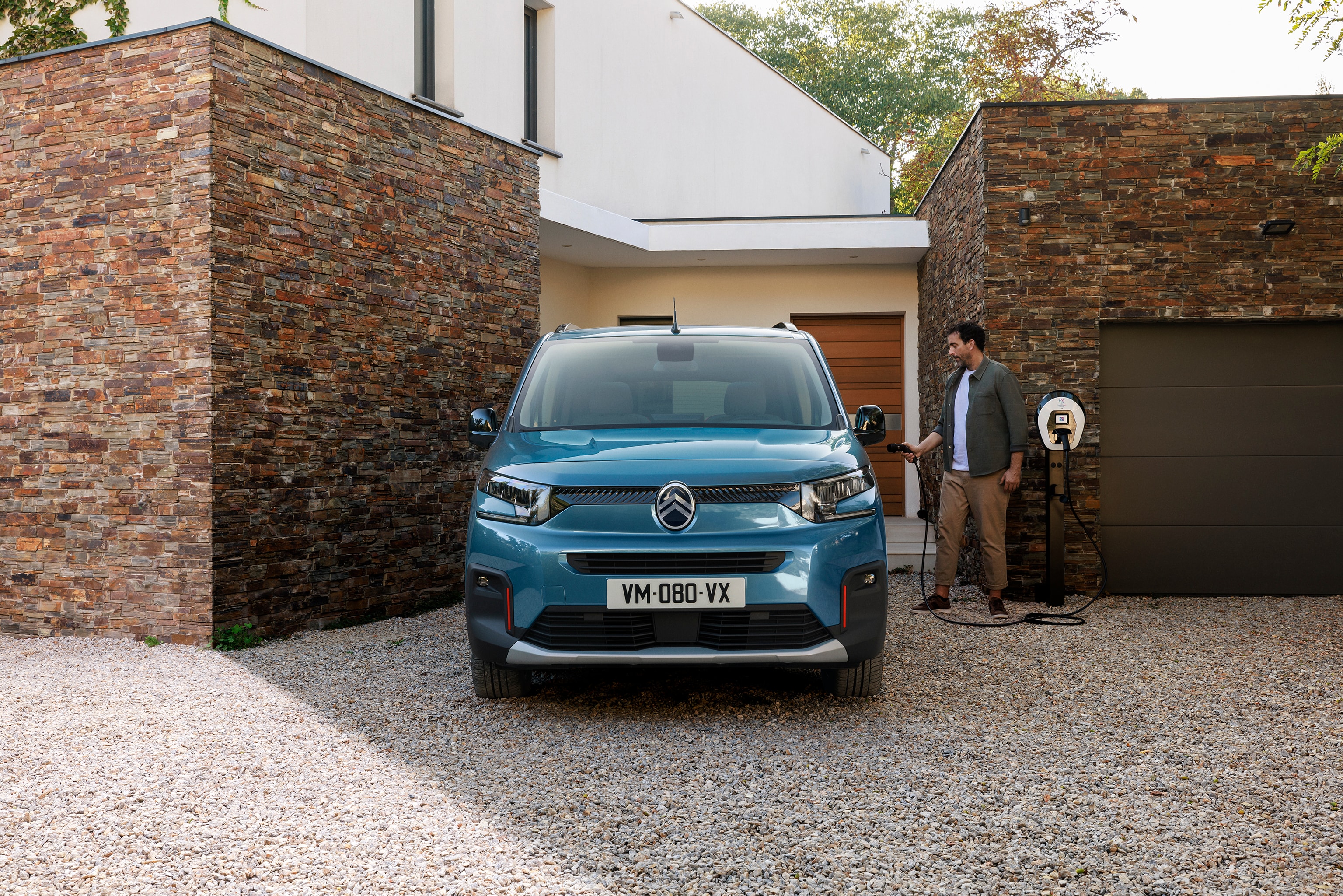 Front view ë-Berlingo showing home electric charging, safety, efficiency and technology for easy everyday family use