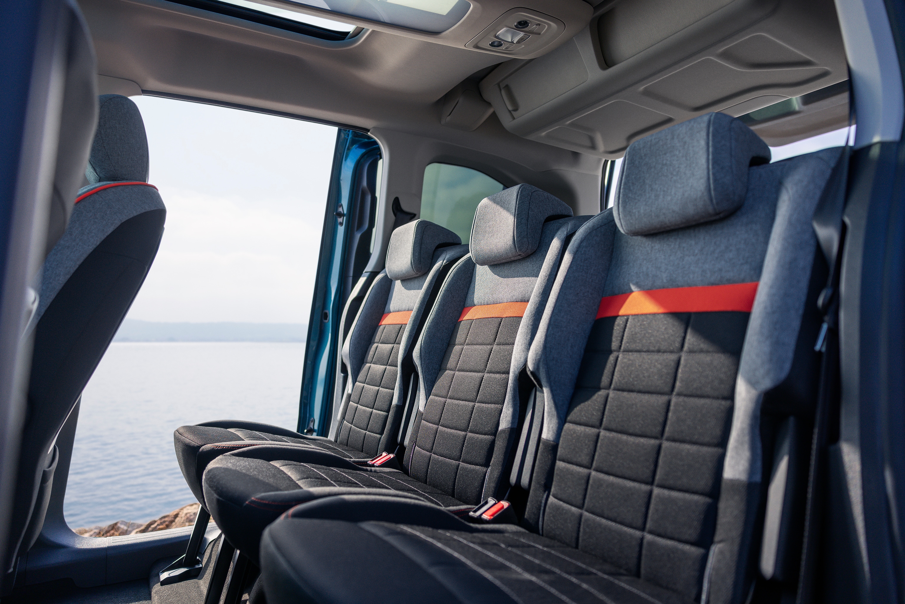 Rear interior view ë-Berlingo highlighting Advanced Comfort seats, space, support and improved family well‑being