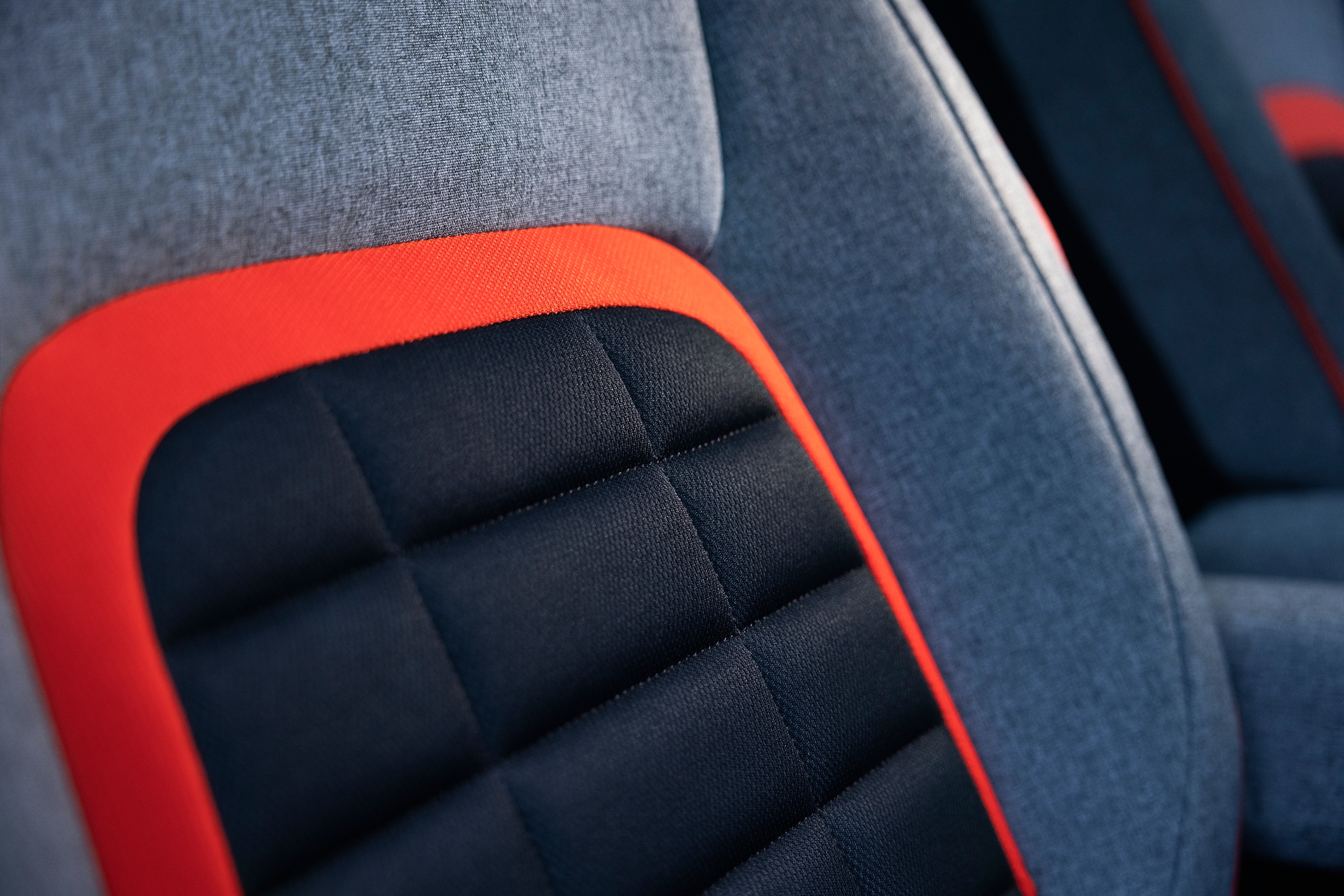 Seat detail view ë-Berlingo highlighting Advanced Comfort upholstery, support, design and enhanced onboard comfort