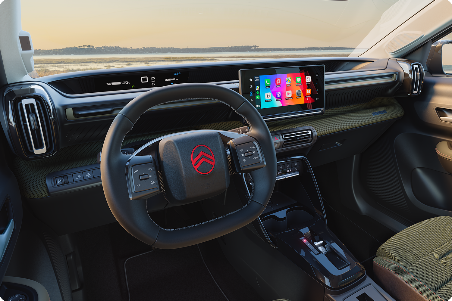 Nahaufnahme des Armaturenbretts des Citroën C3 Outdoor: Der Touchscreen zeigt Advanced-Comfort-Konnektivität für Reisen im kompakten SUV.