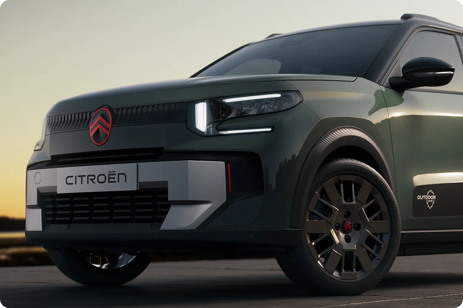 Nahaufnahme des Vorderrads des Citroën C3 Outdoor – robustes, vielseitiges und komfortables Design mit innovativem Styling für alltägliche Fahrten.